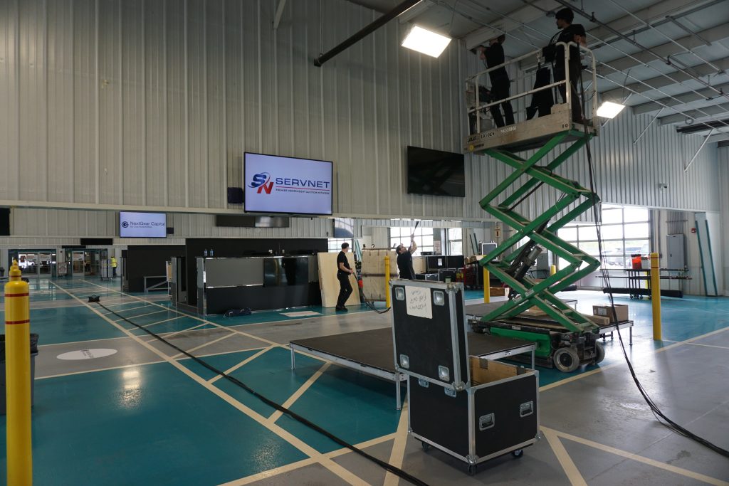 Running cables through the ceiling at NAAA's World Auto Auction Championship